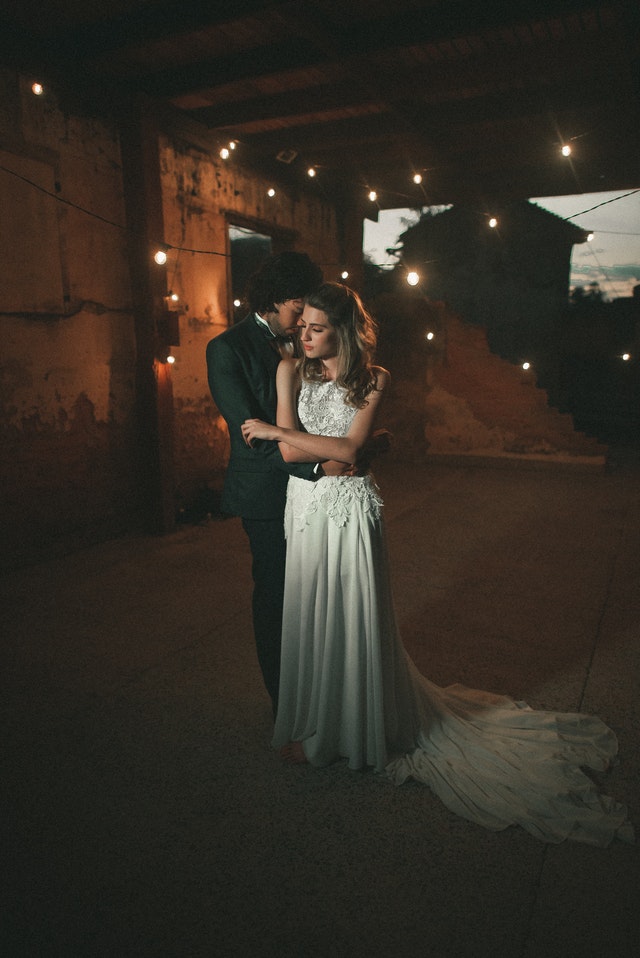 Couple holding hands - wedding journey